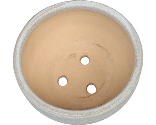 Terrakottakruka med dräneringshål