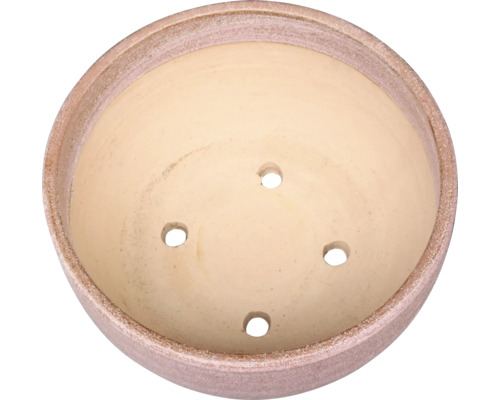 Terrakottakruka med dräneringshål