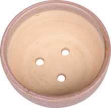 Blomkruka med dräneringshål