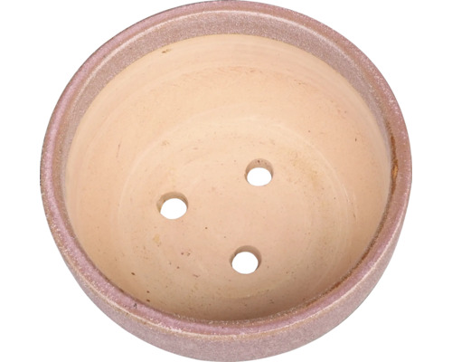 Blomkruka med dräneringshål