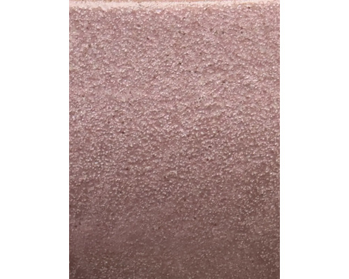 Närbild av en betongsten med grov yta