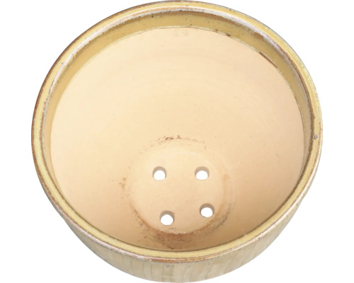 Rund blomkruka med dräneringshål