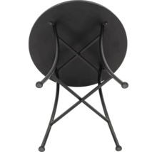 Vy över ett runt, svart trädgårdsbord med metallram.