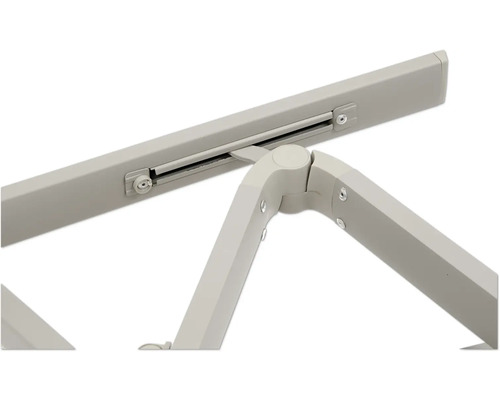 Detaljvy av ett hopfällbart bord med metallram och anslutningsstycken.