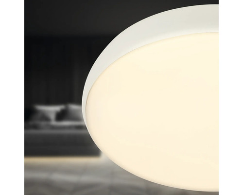 Detalj av vit taklampa