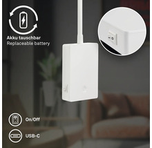 Detaljvy av en lampa med utbytbart batteri, på- och avstängningsknapp samt USB-C-anslutning