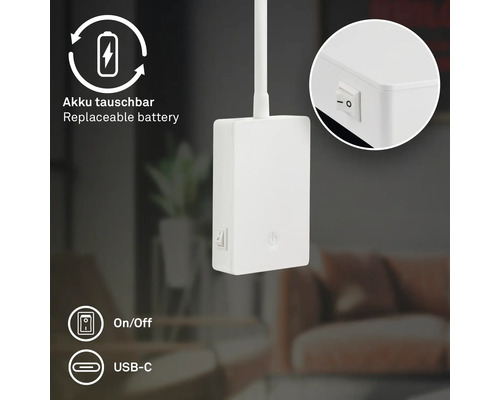 Detaljvy av en lampa med utbytbart batteri, på- och avstängningsknapp samt USB-C-anslutning