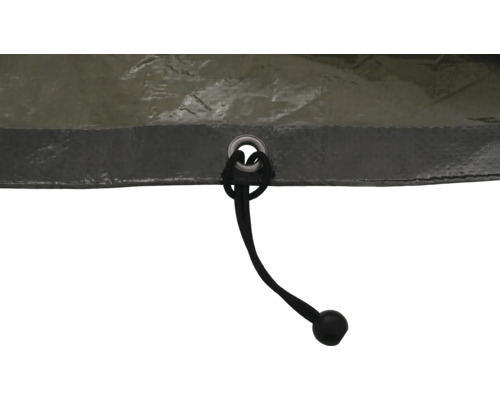 Detaljbild av ett öljet med gummistropp på en presenning.