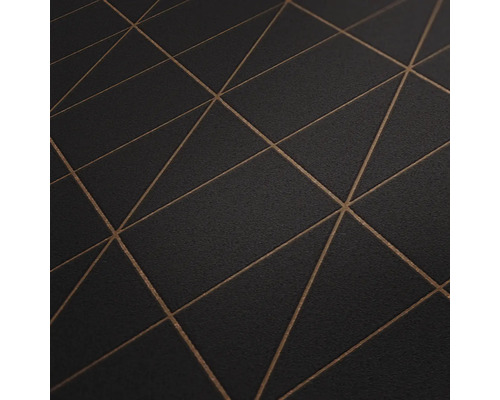 Närbild av en mörk tapet med ett geometriskt triangelmönster