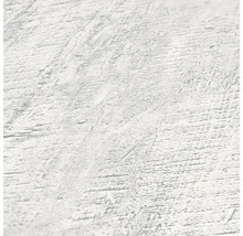 Närbild av en strukturerad, ljus yta.