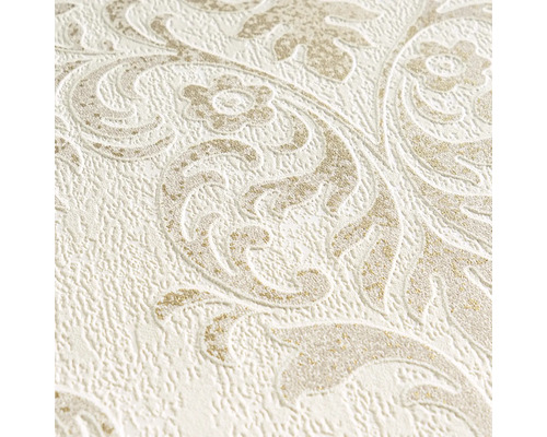 Närbild av en mönstrad tapet med blommiga ornament