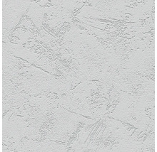 Närbild av en vit vägg med putsstruktur