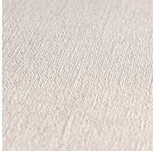 Närbild av en vit textiltapet med fin struktur