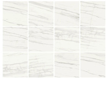 Flera vita plattor med marmorlook.