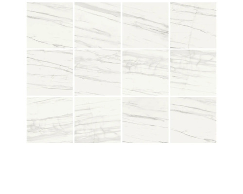 Flera vita plattor med marmorlook.