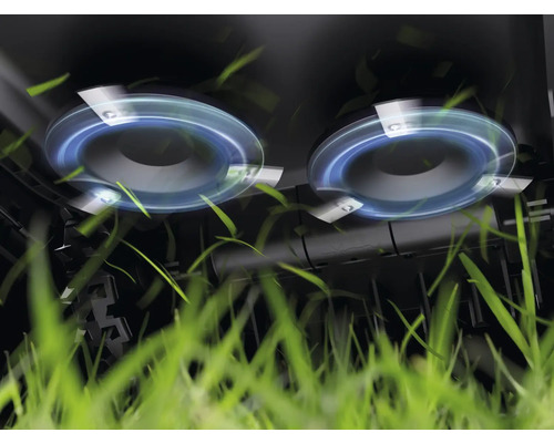 Närbild av klippfunktionen hos en gräsklippare med roterande knivar