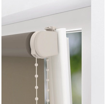 Detaljvy av en rullgardin med kedjedrag för fönsterdekoration