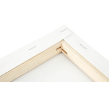 Detalj av ett hörn av en målarduk med duk och träram