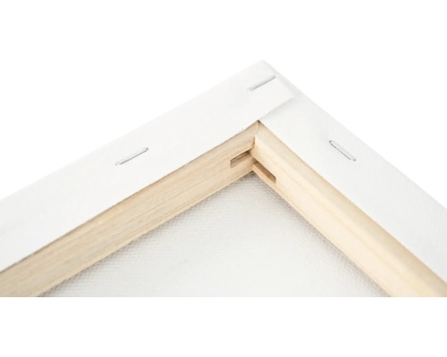 Detaljvy av ett hörn av en målarduk med träram och canvas