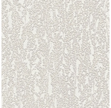 Närbild av en vit strukturtapet med ett oregelbundet mönster