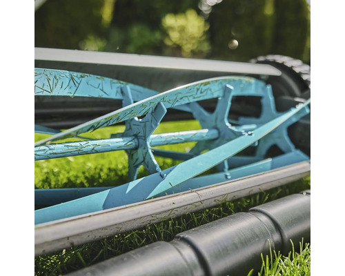 Detalj av cylindergräsklippare med uppsamlingskorg