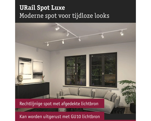 URail Spot Luxe skensystem med flera spotlights i ett vardagsrum.