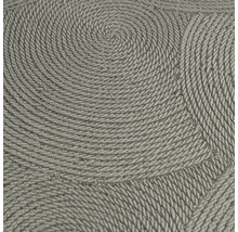 Närbild av en vinyltapet med spiralformat repmönster