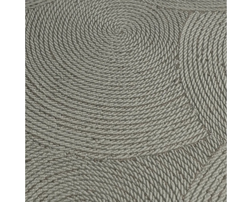 Närbild av en vinyltapet med spiralformat repmönster