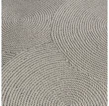 Närbild av en tapet med spiralformat repmönster