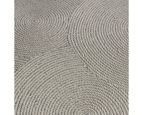 Närbild av en tapet med spiralformat repmönster