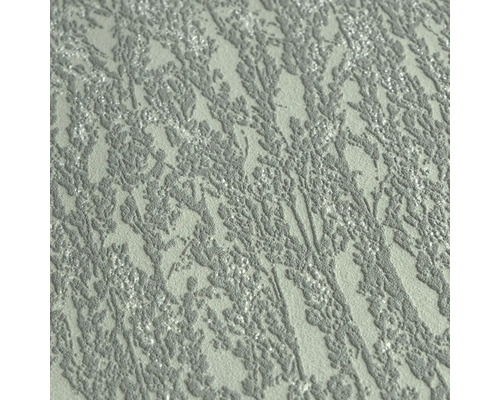 Närbild av en strukturerad tapet med växtmönster