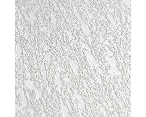 Vit strukturtapet med blommönster