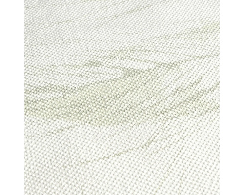 Detaljbild av en ljus matta med mönster