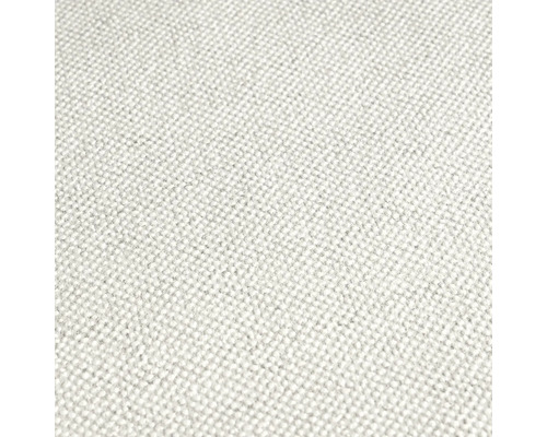 Närbild av ett ljust, vävt tyg för klädsel