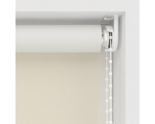 Rullgardin med pärlkedja i fönsterkarmen