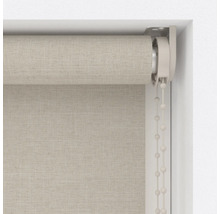 Detaljvy av en tygrullgardin vid fönstret