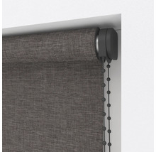 Detaljvy av en grå rullgardin på fönstret