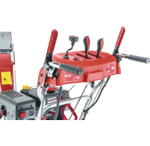 Detaljerad vy över kontrollerna på en snöslunga