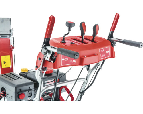 Detaljerad vy över kontrollerna på en snöslunga