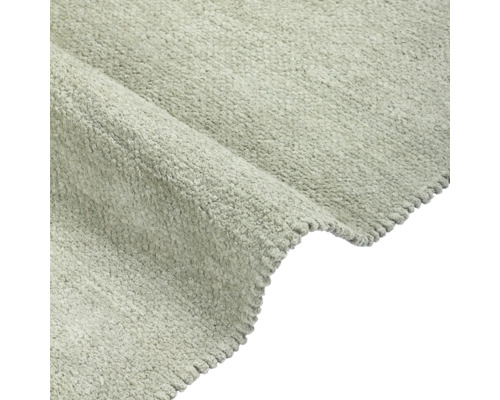 Detaljvy av en matta med kort lugg