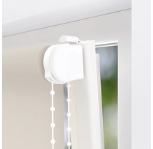 Detaljvy av en rullgardin med kedjedrag för fönsterdekoration