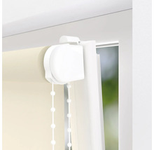 Detalj av en rullgardin med kedjedrift på ett fönster