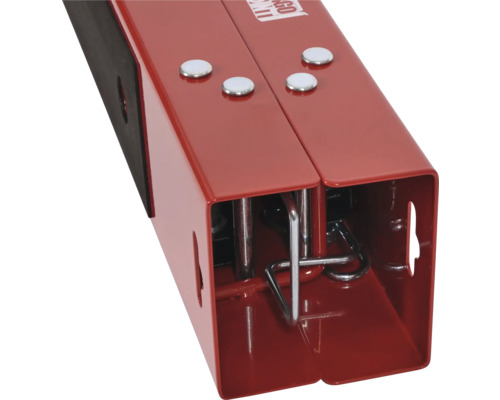 Detaljvy av en röd, justerbar arbetsbänk