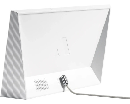 Bakifrån av en vit bordslampa med grå kabel