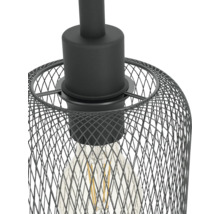 Detaljvy av hängande lampa med trådskärm