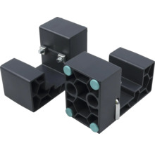 Två svarta distansblock i plast med bikakestruktur, metallbultar och glidytor.