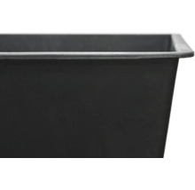 Detaljvy av en murbruksbalja