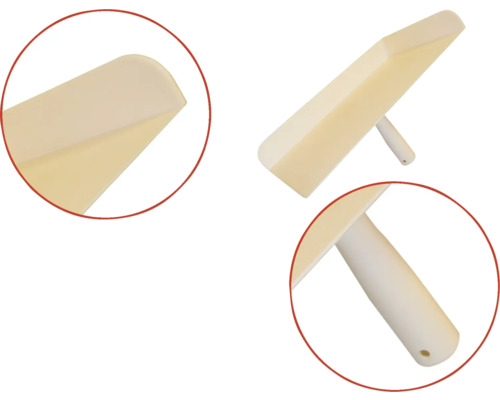 Plastspackel med handtag för bearbetning av spackel