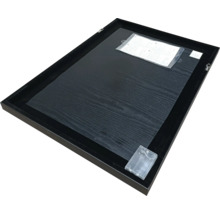 Baksida av en bildram med trästruktur