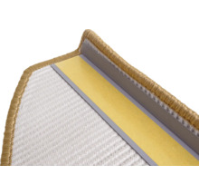 Detaljvy av en mattkant med fästband